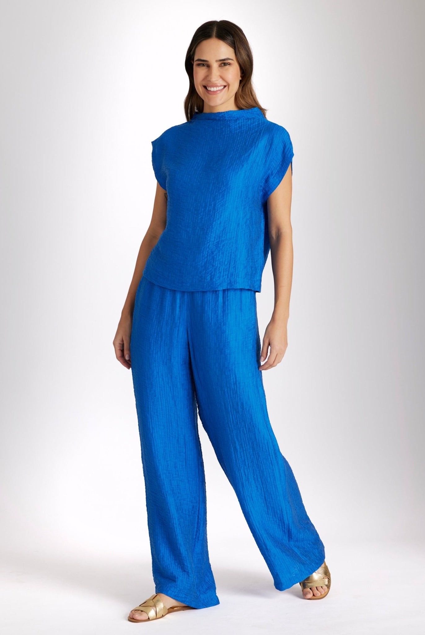 Lange Hose NAJUPI mit Gummibund, seitlichen Eingrifftaschen, weitem Bein und strukturiertem Stoff in Blau