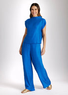 Lange Hose NAJUPI mit Gummibund, seitlichen Eingrifftaschen, weitem Bein und strukturiertem Stoff in Blau 