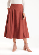 Rock GOMYRO in Midi-Länge mit Falten und Eingrifftaschen in Braun